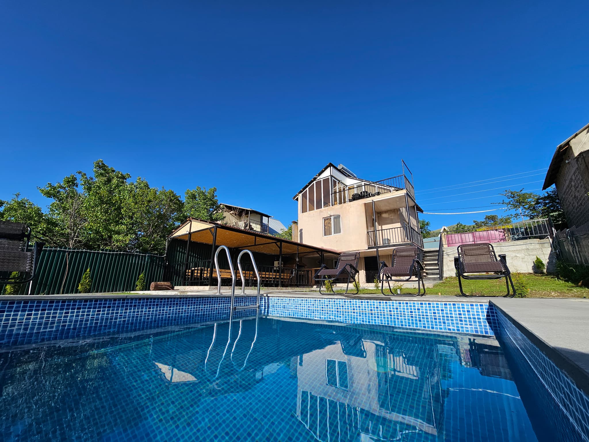 AralanjINN exterior — stone villa on Ara Mountain